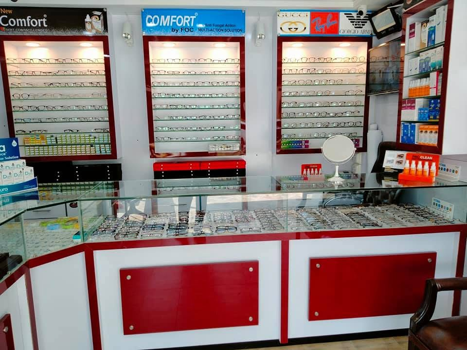 Uzma Optical display counter with frames and contact lens solutions